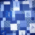 Blue embroidered quilt